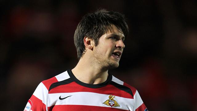The 24-year-old defender George Friend moves from Doncaster to Middlesbrough